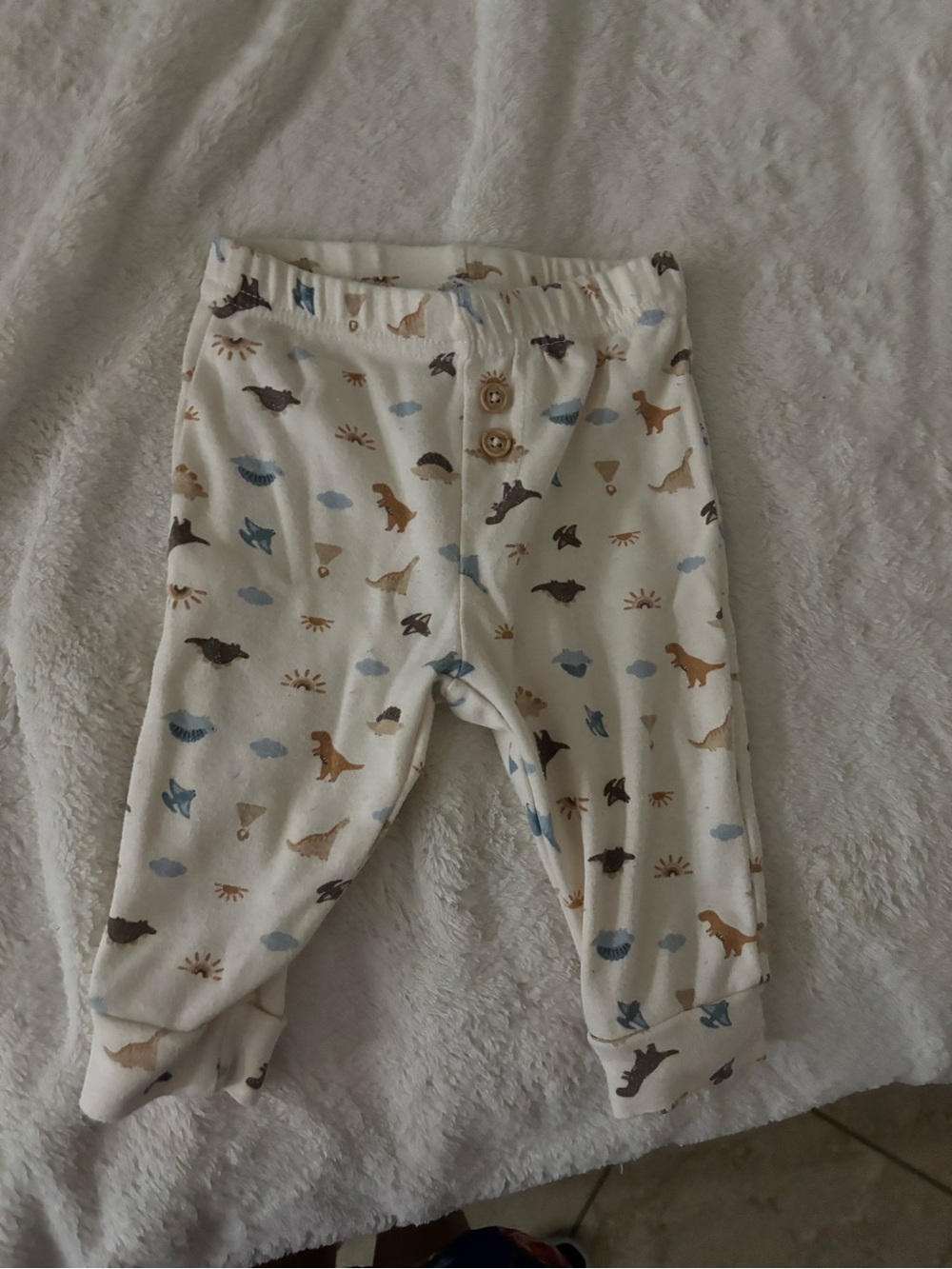 chick pea Cream Baby Pants with Blue and Brown Dino Prints